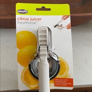 White and Stainless Steel Citrus Juicer by chef'n
